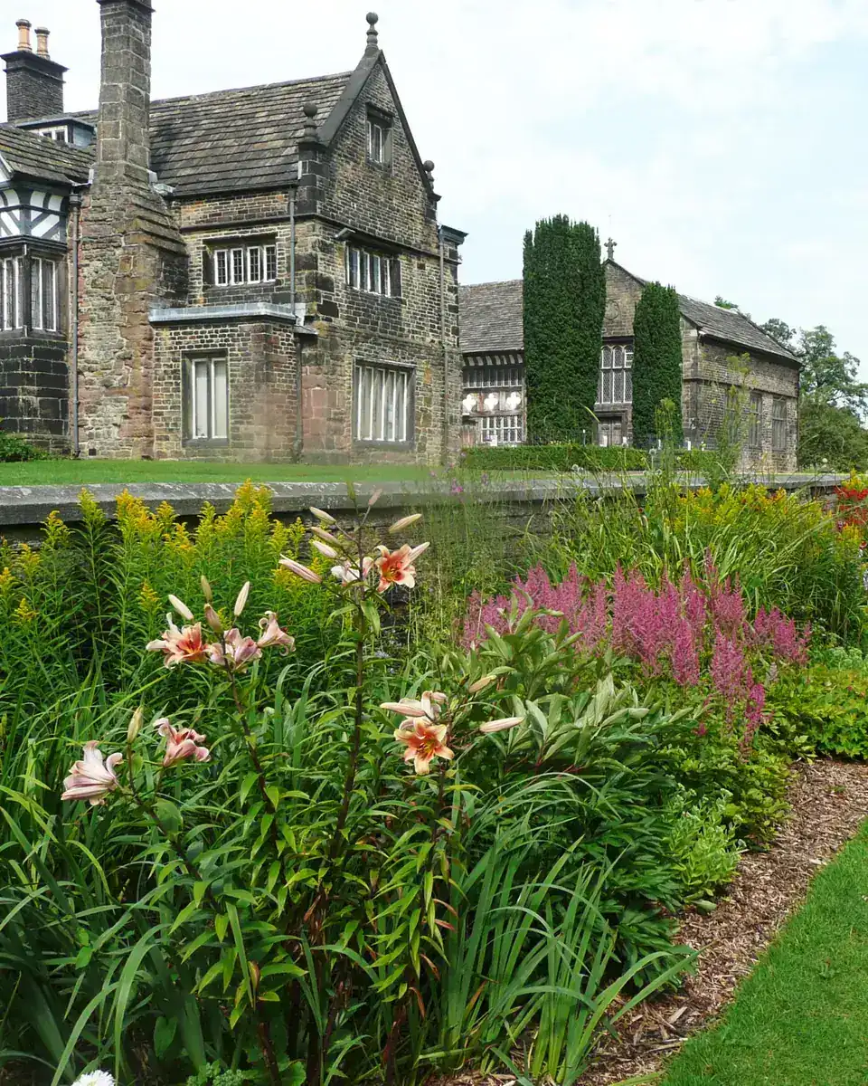 Smithills Hall and its herbaceous border in summer, Bolton